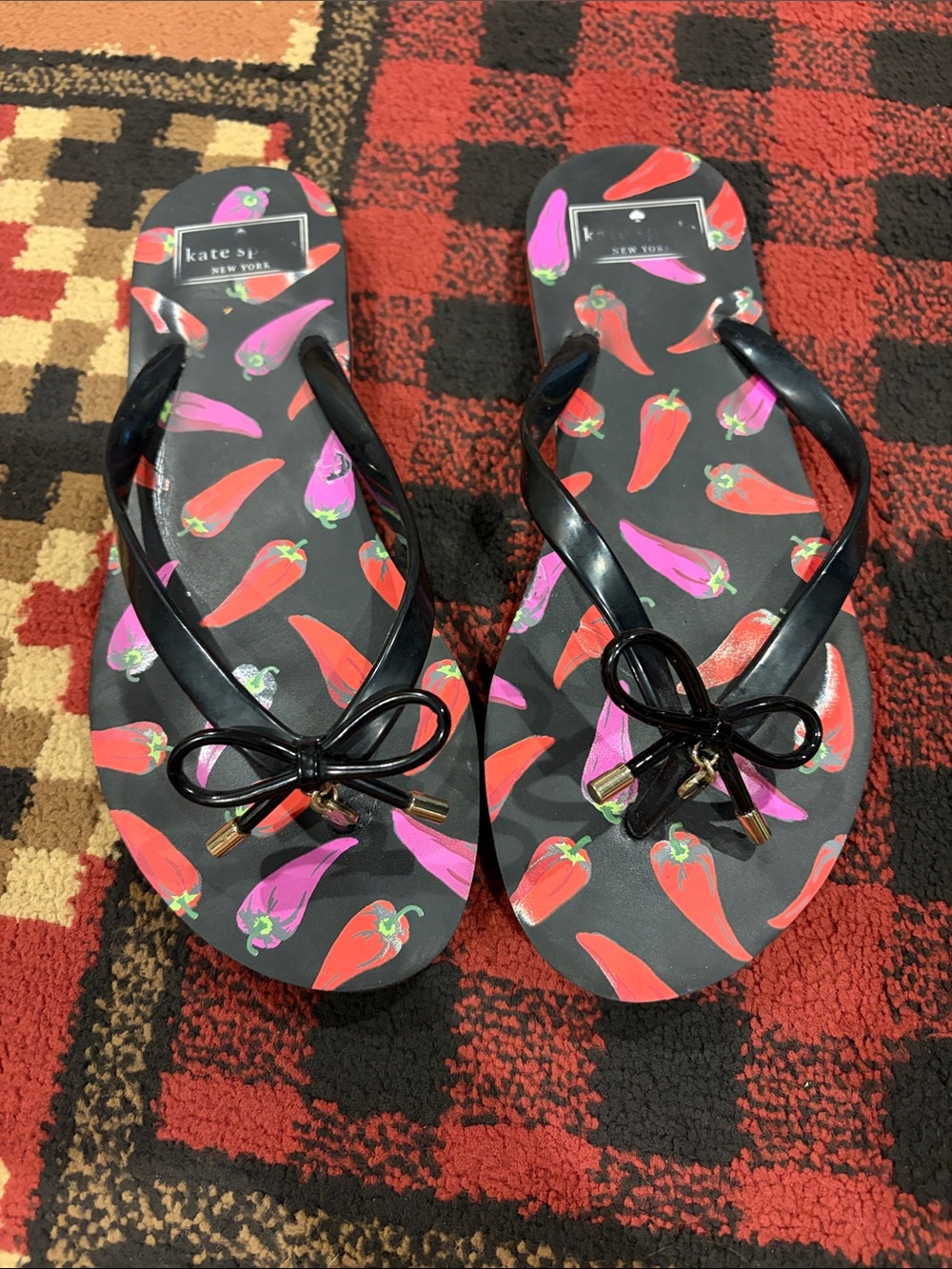 Women’s Kate Spade New York black bow tie rubber pepper sandals